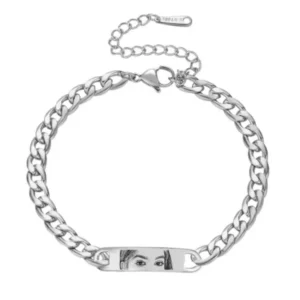Close-up of custom eye photo bracelet in silver finish
