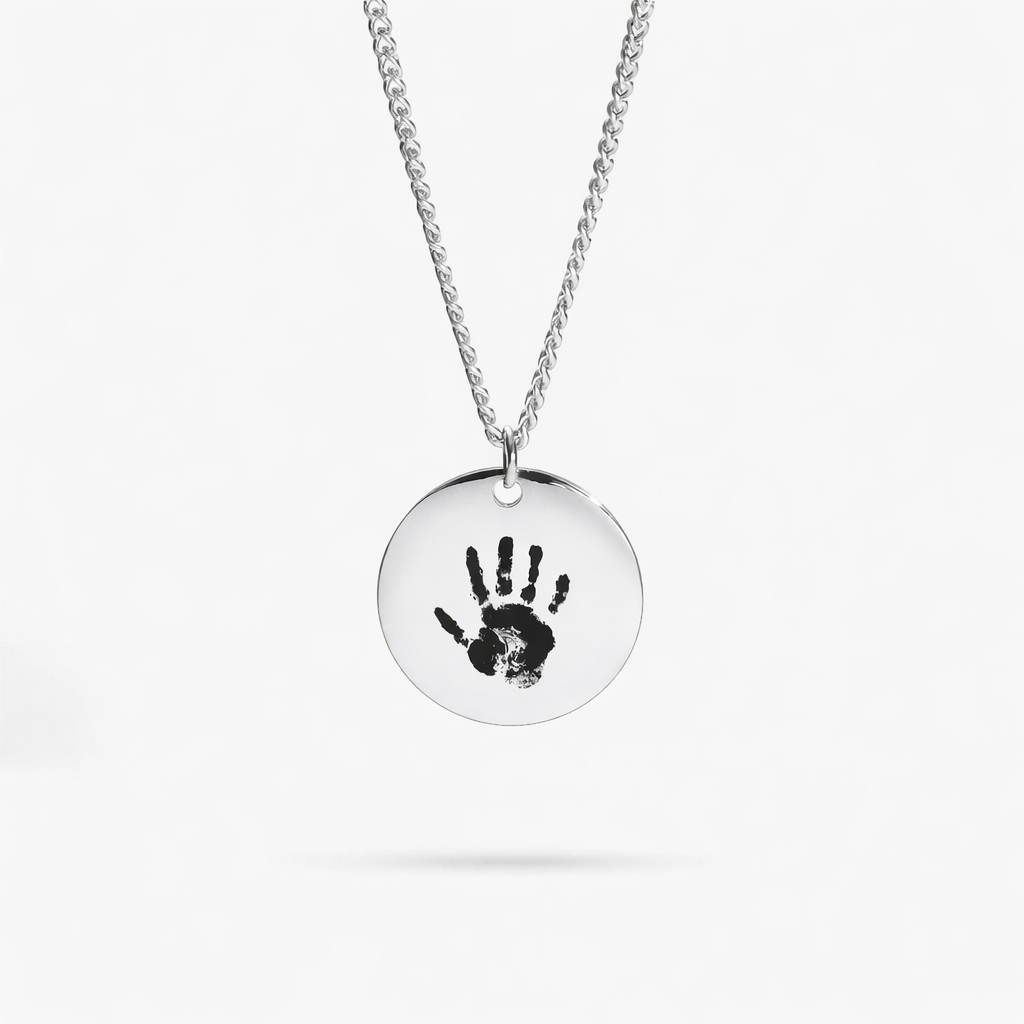 Custom engraved baby handprint necklace in silver