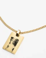 Close-up of a custom pet photo necklace, highlighting the intricate details and personalized pet image.