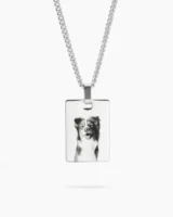 A personalized pet photo necklace in sterling silver, featuring a cherished image of your pet.