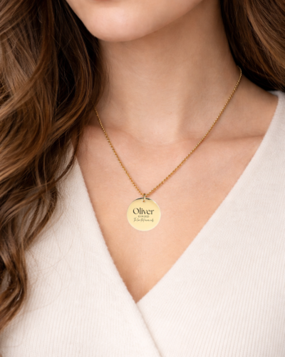 Custom Necklace with Personalized Text:A custom gold necklace with personalized text engraved, making it a timeless and meaningful accessory."