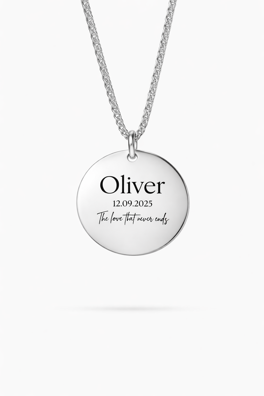 A personalized sterling silver necklace featuring custom text engraving, offering a sleek and elegant design.