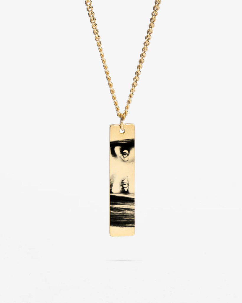 Gold Personalized Eye Photo Necklace with black and white engraved image on bar pendant