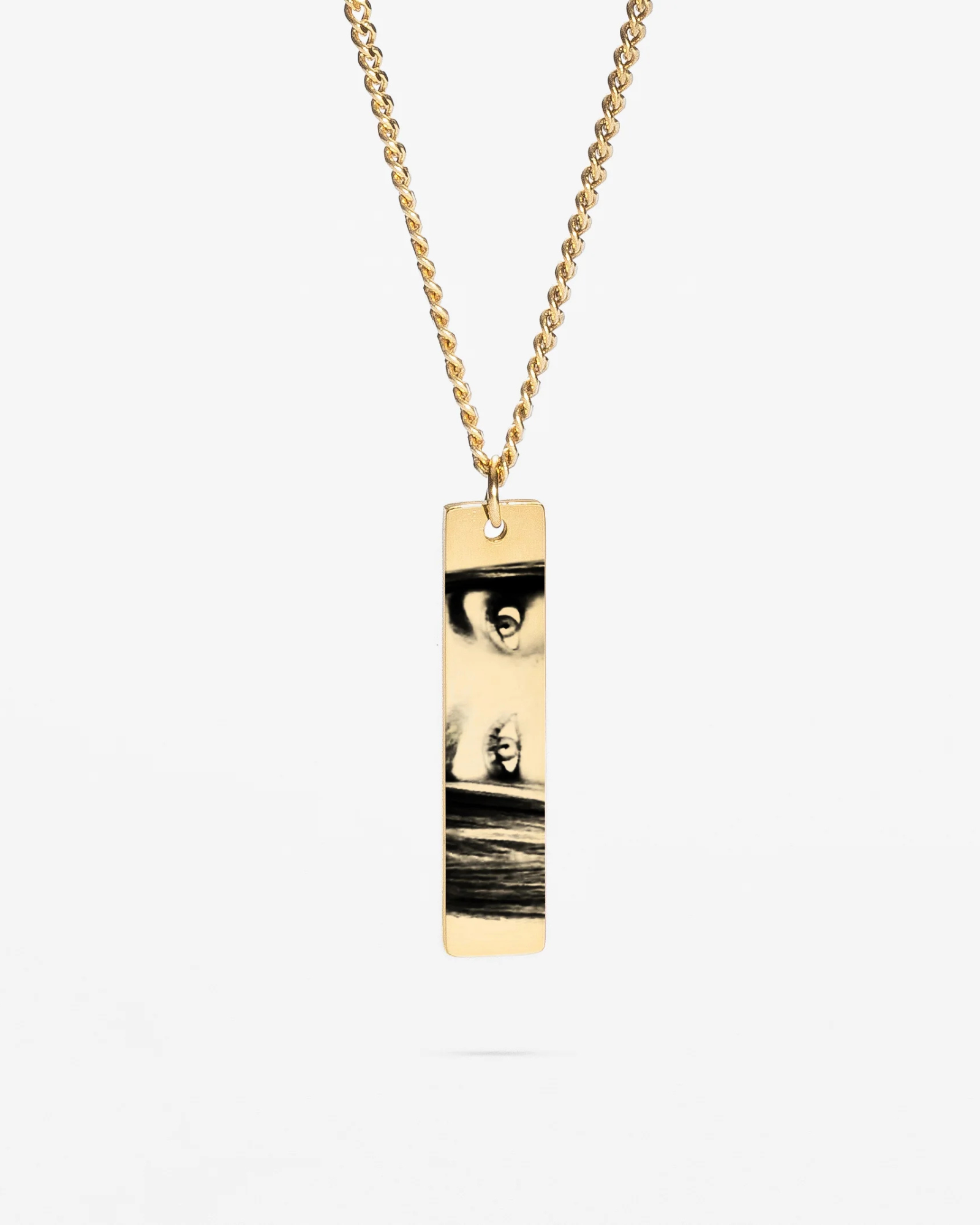 Gold Personalized Eye Photo Necklace with black and white engraved image on bar pendant
