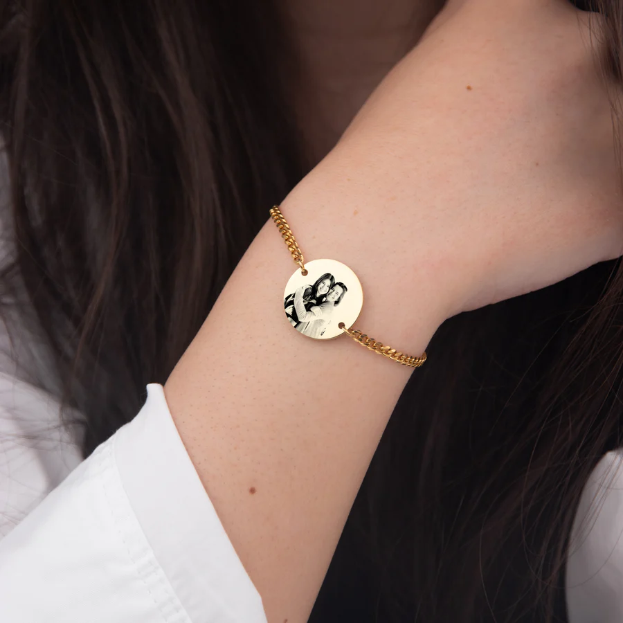 Woman wearing an engraved portrait bracelet for mom with custom image