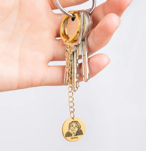 Close-up of personalized portrait keychain with fine engraving details