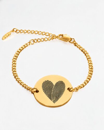 Two fingerprint bracelet in silver — two actual fingerprints engraved as a heart on a round disc, Cuban chain bracelet with lobster clasp and extender. Personalized couples fingerprint bracelet in stainless steel.