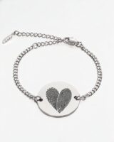 Two fingerprint bracelet in silver — two actual fingerprints engraved as a heart on a round disc, Cuban chain bracelet with lobster clasp and extender. Personalized couples fingerprint bracelet in stainless steel.