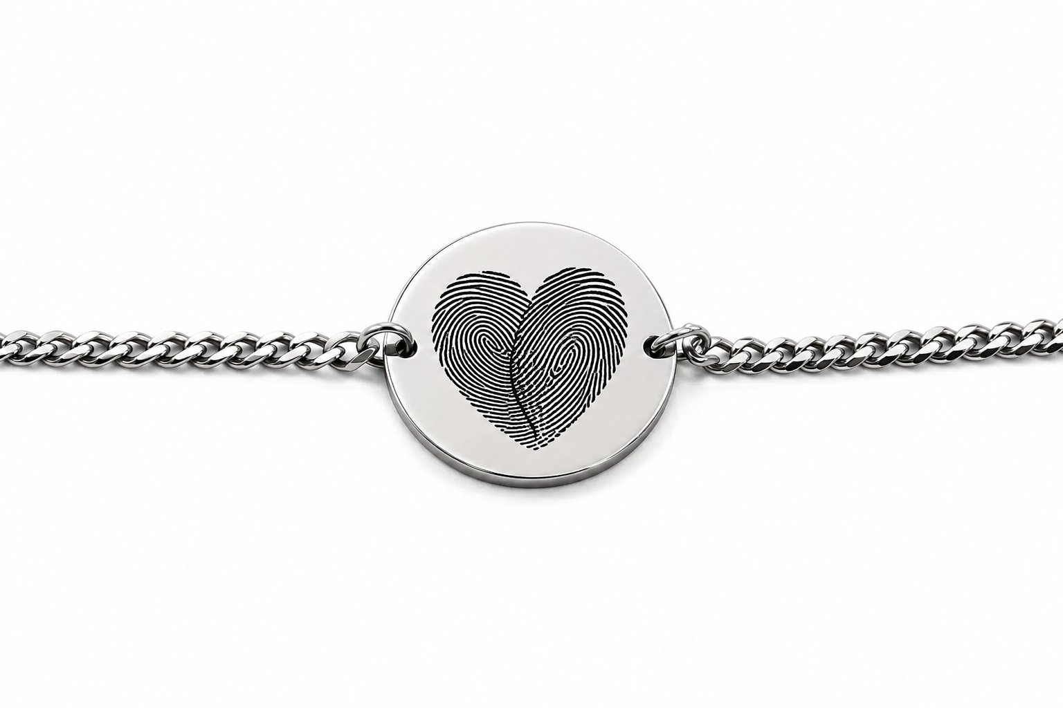 Close-up of a silver fingerprint disc bracelet showing two fingerprints engraved together as a heart. Custom thumbprint bracelet detail, engraved to order from your own fingerprint photos.
