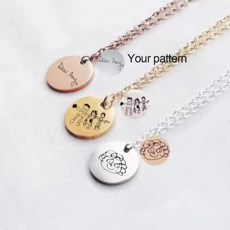 kids drawing engraved neklaces