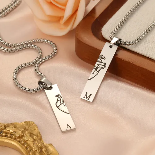 Matching couple necklaces with engraved initials – romantic gift for anniversaries or Valentine’s Day i need caption and description fr these alt text